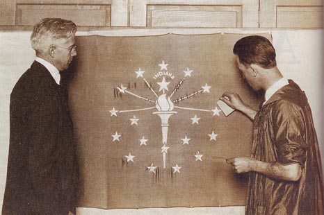 Paul Hadley, designer of the Indiana State Flag, with art student Ralph E. Priest (1923). Hadley's design was adopted in 1917 by the Indiana General Assembly.