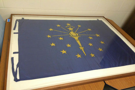 Paul Hadley's state flag design (shown in the previous B/W photo) is now preserved at the Indiana State Library by the Indiana Historical Bureau.